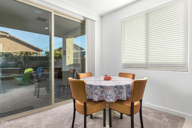 view of carpeted dining room