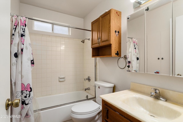 bathroom featuring vanity, shower / bath combination with curtain, and toilet