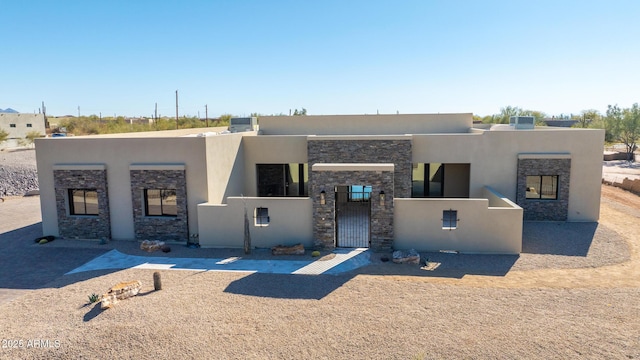 view of pueblo revival-style home