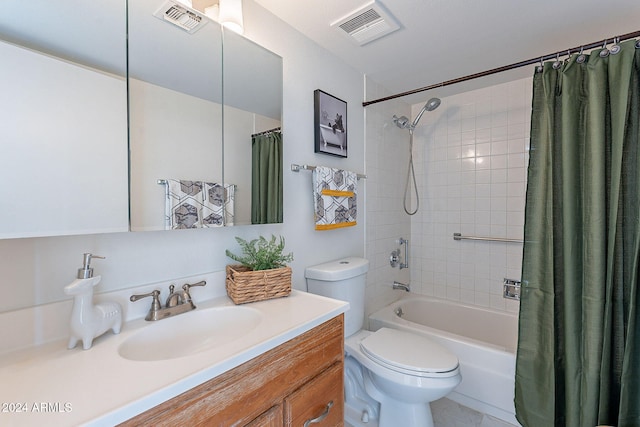 full bathroom featuring shower / tub combo, vanity, and toilet