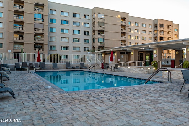 view of swimming pool featuring a patio