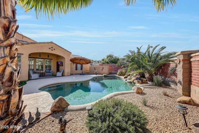 view of pool with a patio area