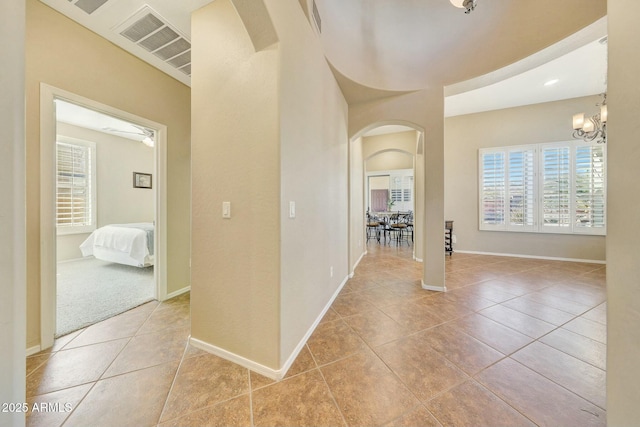 corridor featuring tile patterned flooring