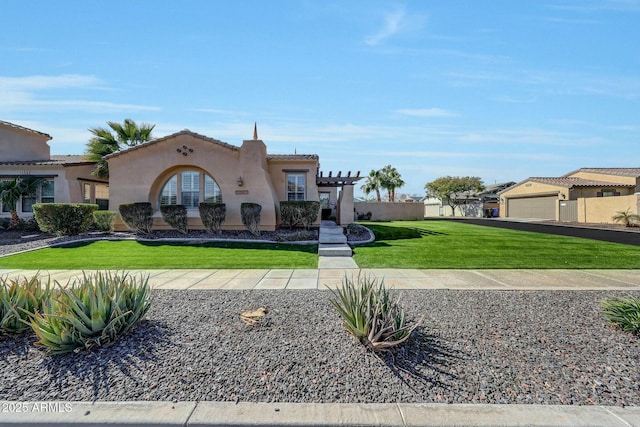 mediterranean / spanish house featuring a garage, a pergola, and a front lawn