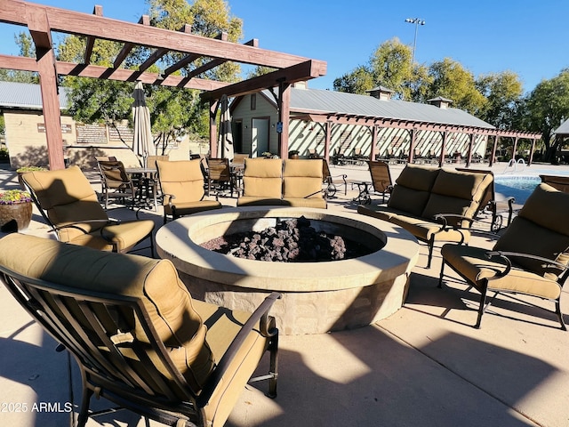 view of patio / terrace featuring a gazebo, a pergola, and an outdoor living space with a fire pit