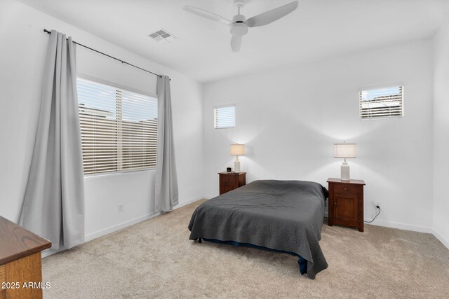 3913 W Mcneil St, Laveen, AZ 85339 - carpeted bedroom with baseboards, visible vents, and ceiling fan