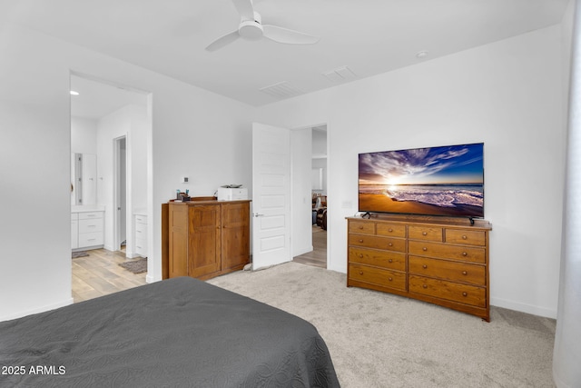 3913 W Mcneil St, Laveen, AZ 85339 - bedroom featuring carpet flooring, connected bathroom, baseboards, and ceiling fan