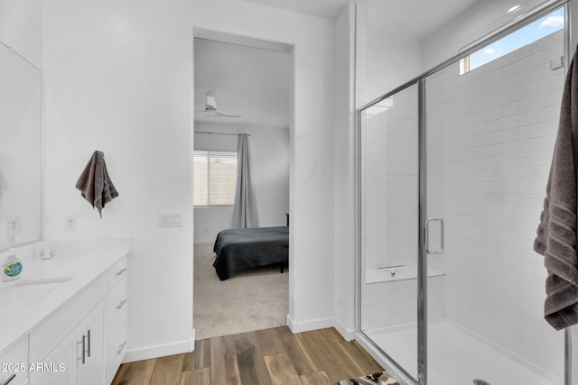 3913 W Mcneil St, Laveen, AZ 85339 - full bath with vanity, wood finished floors, a stall shower, and baseboards