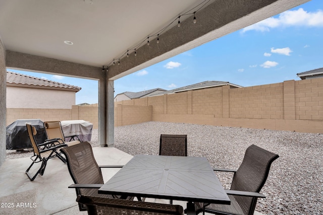 3913 W Mcneil St, Laveen, AZ 85339 - view of patio / terrace with a grill, a fenced backyard, and outdoor dining space