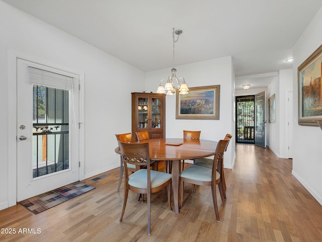 525 E Turkey Trl, Munds Park, AZ 86017 - dining area featuring a chandelier and light wood finished floors