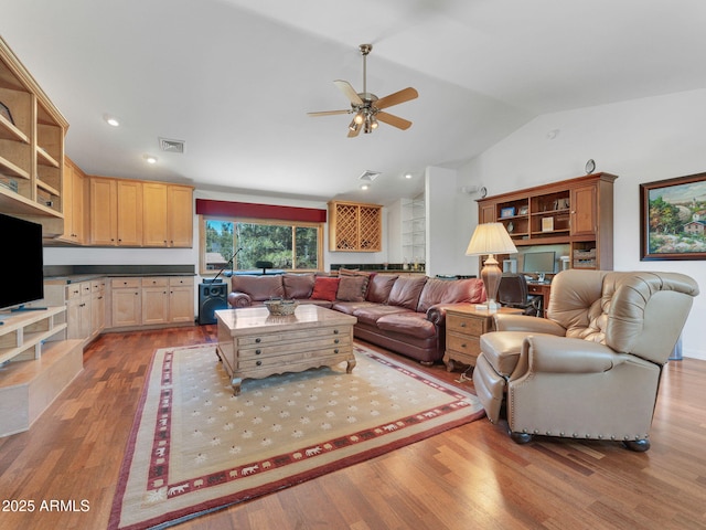 525 E Turkey Trl, Munds Park, AZ 86017 - living room with vaulted ceiling, a ceiling fan, wood finished floors, and recessed lighting