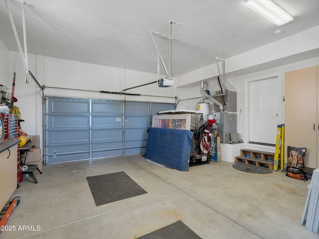 525 E Turkey Trl, Munds Park, AZ 86017 - garage with a garage door opener, heating unit, and electric water heater