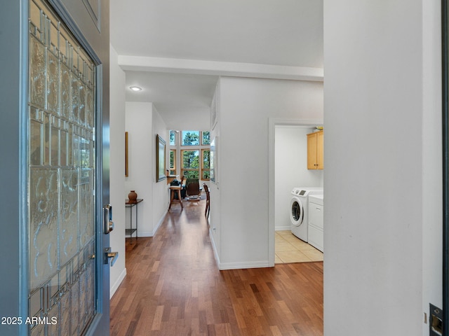 525 E Turkey Trl, Munds Park, AZ 86017 - entrance foyer featuring washing machine and clothes dryer and wood finished floors
