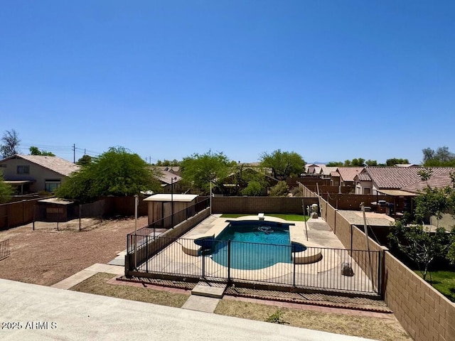 2634 S 63rd Dr, Phoenix, AZ 85043 - view of swimming pool featuring a diving board, a fenced backyard, and a patio