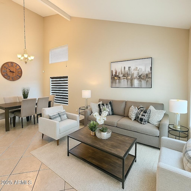 2634 S 63rd Dr, Phoenix, AZ 85043 - living room with a chandelier, light tile patterned flooring, beam ceiling, and high vaulted ceiling