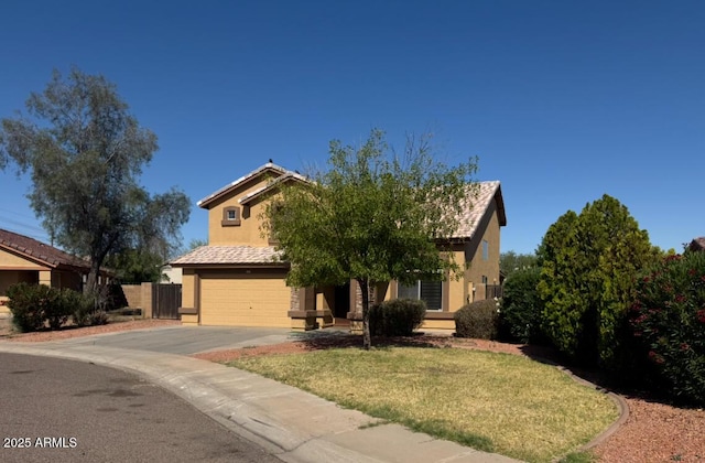 2634 S 63rd Dr, Phoenix, AZ 85043 - view of property hidden behind natural elements with stucco siding, driveway, and a garage