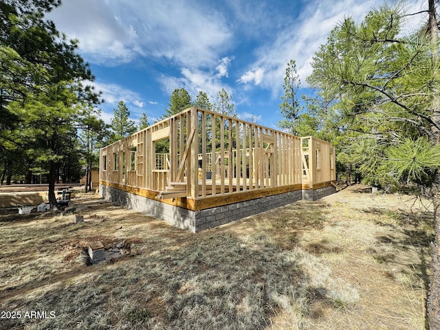 2627 San Juan Dr, Happy Jack, AZ 86024 - view of home's exterior with a wooden deck