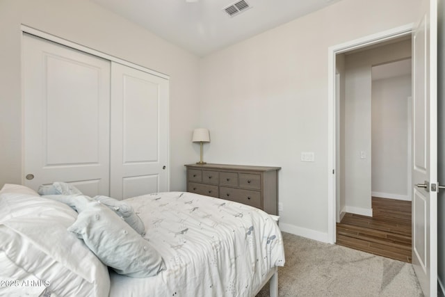 20606 E Avenida Del Valle Ct, Queen Creek, AZ 85142 - carpeted bedroom featuring baseboards, a closet, and visible vents