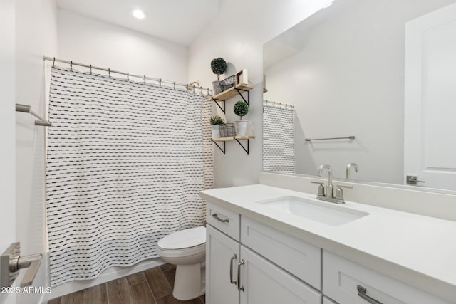 20606 E Avenida Del Valle Ct, Queen Creek, AZ 85142 - bathroom featuring vanity, toilet, shower / bathtub combination with curtain, recessed lighting, and wood finished floors