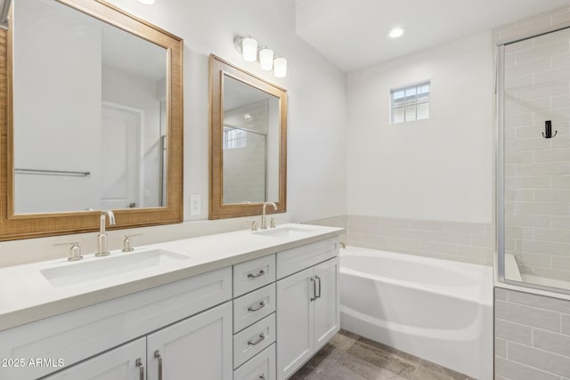 20606 E Avenida Del Valle Ct, Queen Creek, AZ 85142 - bathroom featuring double vanity, a tile shower, a sink, and a bath