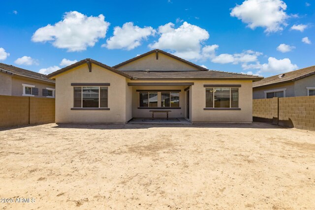 20606 E Avenida Del Valle Ct, Queen Creek, AZ 85142 - rear view of property featuring a tile roof, a fenced backyard, and stucco siding