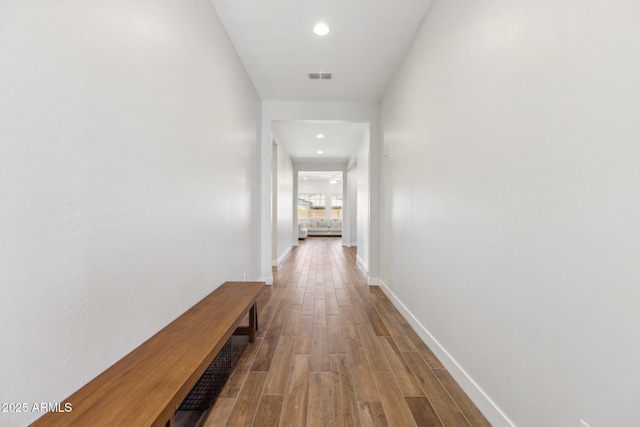20606 E Avenida Del Valle Ct, Queen Creek, AZ 85142 - hall featuring baseboards, recessed lighting, wood finished floors, and visible vents