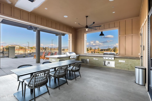 20606 E Avenida Del Valle Ct, Queen Creek, AZ 85142 - view of patio with grilling area, fence, outdoor dining area, and exterior kitchen