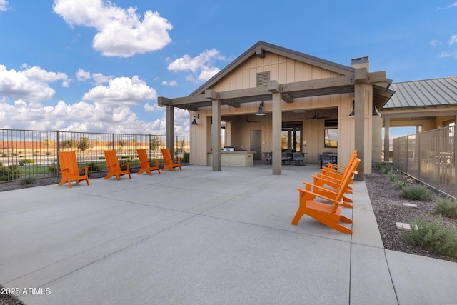 20606 E Avenida Del Valle Ct, Queen Creek, AZ 85142 - view of patio / terrace with a ceiling fan, fence, and an outdoor kitchen