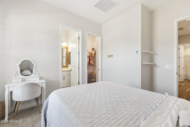 20606 E Avenida Del Valle Ct, Queen Creek, AZ 85142 - bedroom with visible vents and ensuite bath