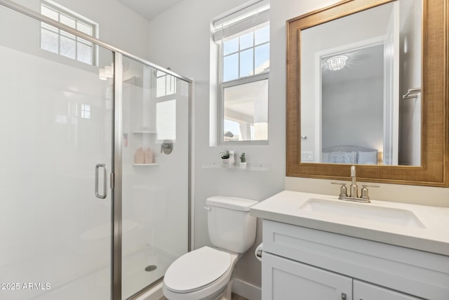 20606 E Avenida Del Valle Ct, Queen Creek, AZ 85142 - bathroom with vanity, a stall shower, and toilet