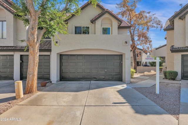 view of front of home with a garage