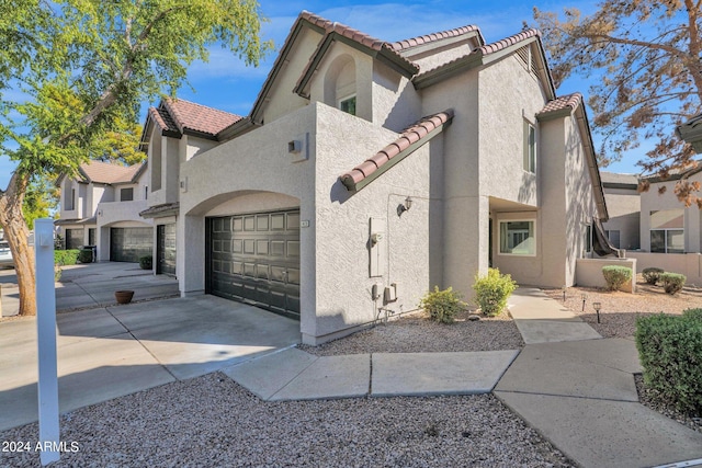 view of front of home with a garage