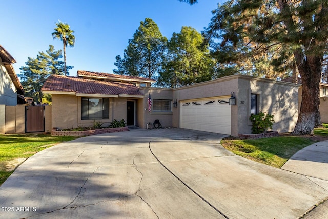 ranch-style house with a front lawn and a garage