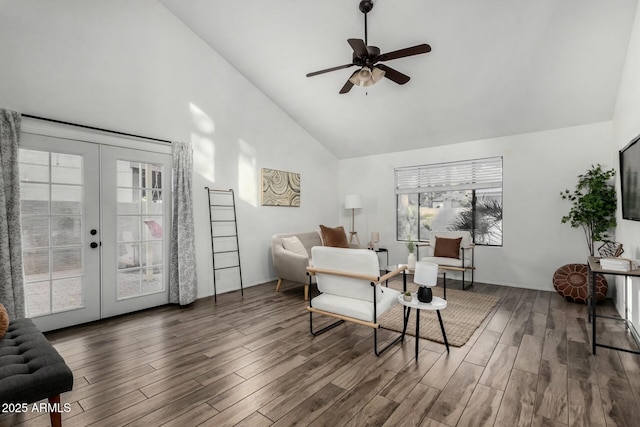 living room featuring ceiling fan, french doors, and high vaulted ceiling