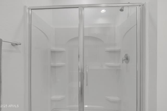 full bath featuring a stall shower