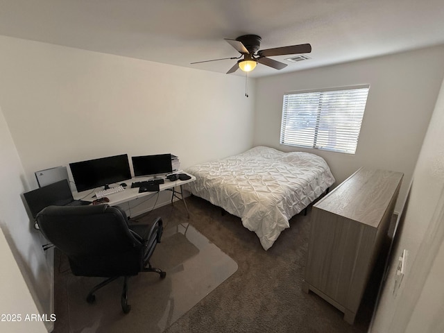 carpeted bedroom featuring visible vents and a ceiling fan