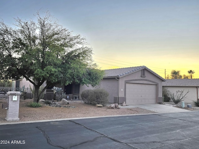 view of front of property featuring a garage