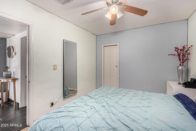 2802 E Virginia Ave, Phoenix, AZ 85008 - bedroom with wood finished floors, ceiling fan, and a closet