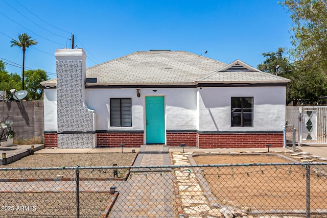 2802 E Virginia Ave, Phoenix, AZ 85008 - view of front of property featuring stucco siding, brick siding, and a chimney