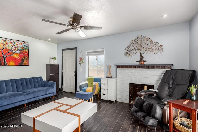 2802 E Virginia Ave, Phoenix, AZ 85008 - living room with dark wood-type flooring, ceiling fan, a brick fireplace, and recessed lighting
