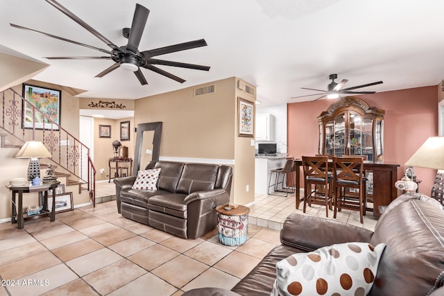 living room with light tile patterned floors