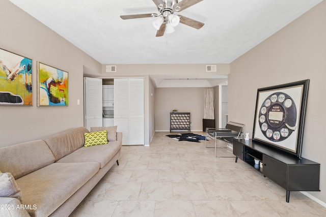 living room with ceiling fan