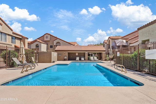 view of pool featuring a patio