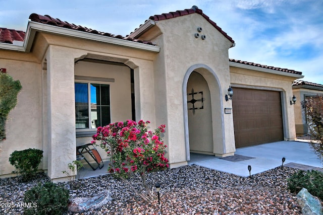 view of front of home with a garage