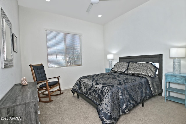 bedroom featuring ceiling fan and carpet