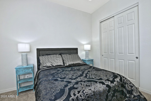 carpeted bedroom with a closet