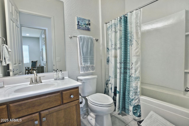 full bathroom featuring tile patterned flooring, shower / tub combo with curtain, vanity, and toilet