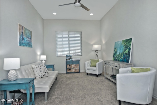 living room with carpet flooring and ceiling fan