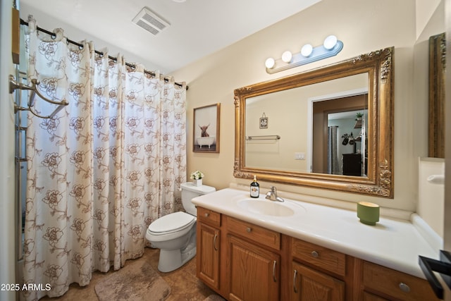 full bathroom with visible vents, vanity, and toilet