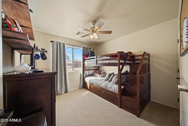 bedroom featuring a ceiling fan, carpet, visible vents, and baseboards